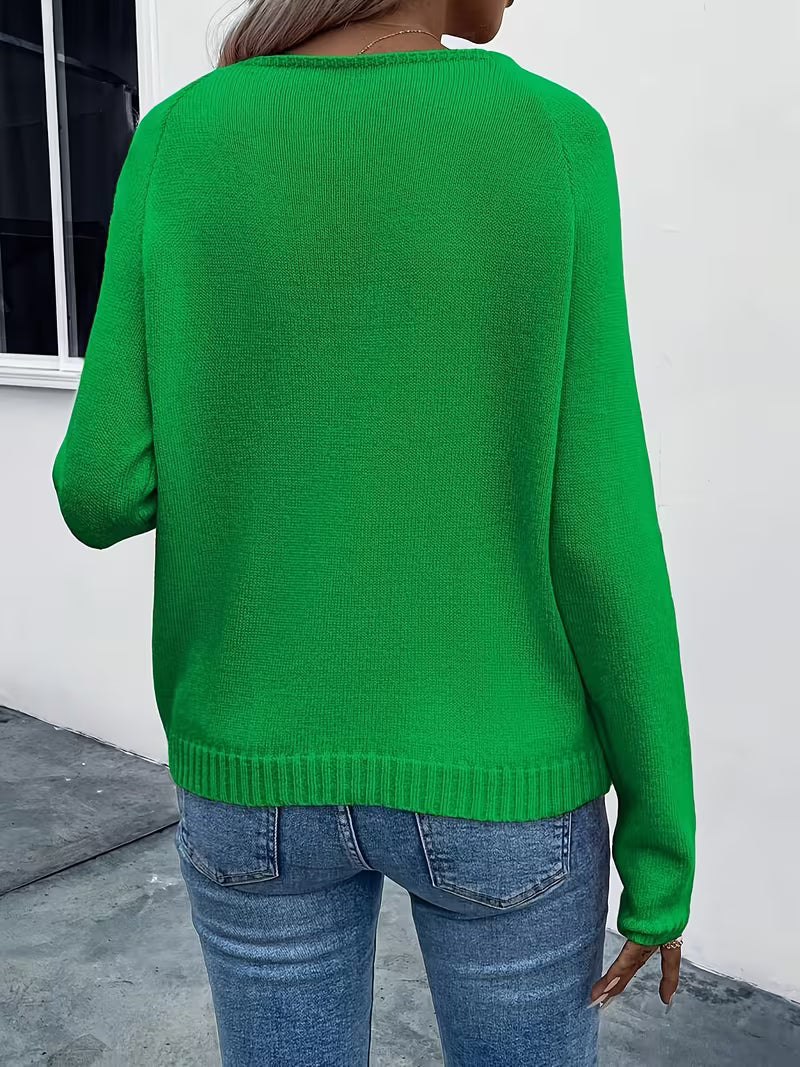 Maglione primaverile con dettaglio floreale